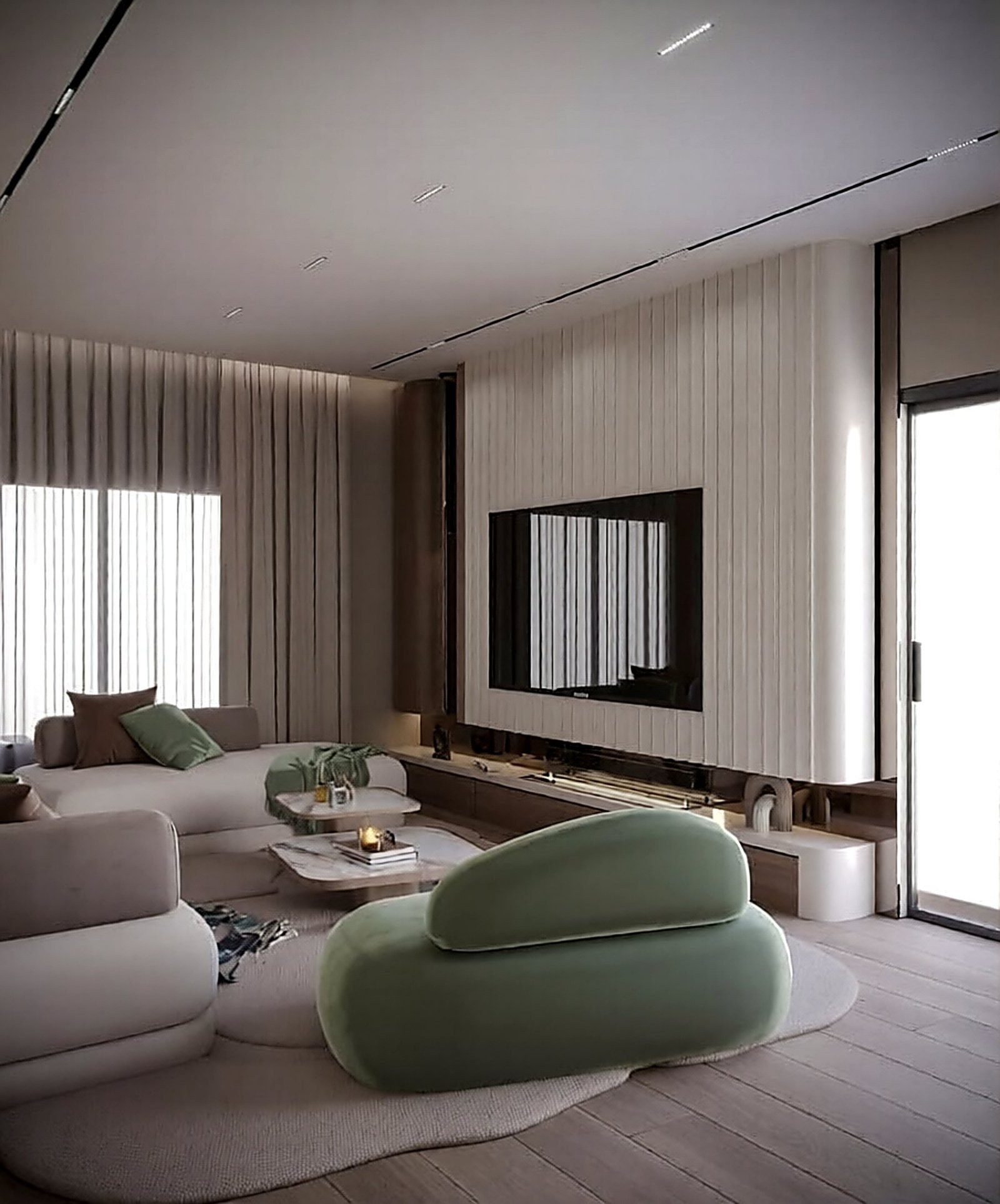 Lounge with a sage pebble sofa and fluted panelling